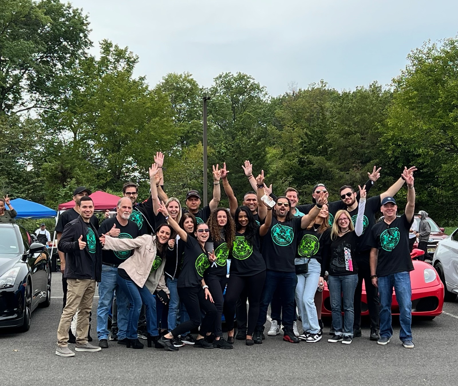 BimToberFest team cheering in green crest shirts